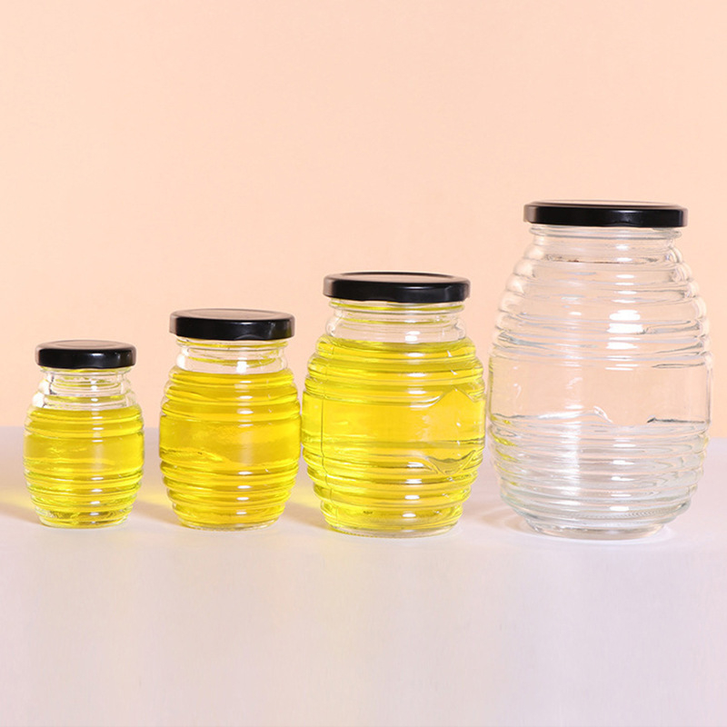 螺丝蜂蜜瓶1 Honeycomb shaped glass honey bottle (1)