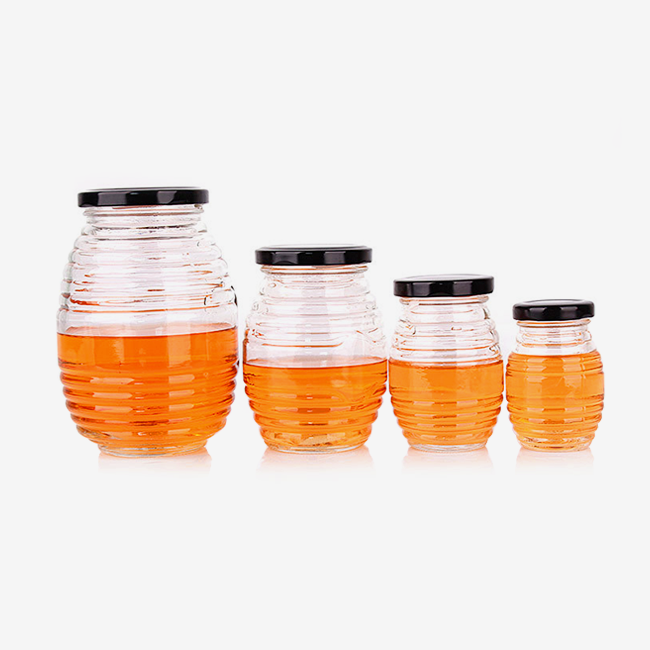Honeycomb shaped glass honey bottle