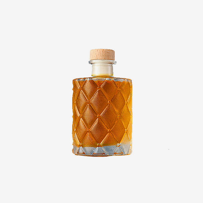 Diamond-shaped fruit wine bottle