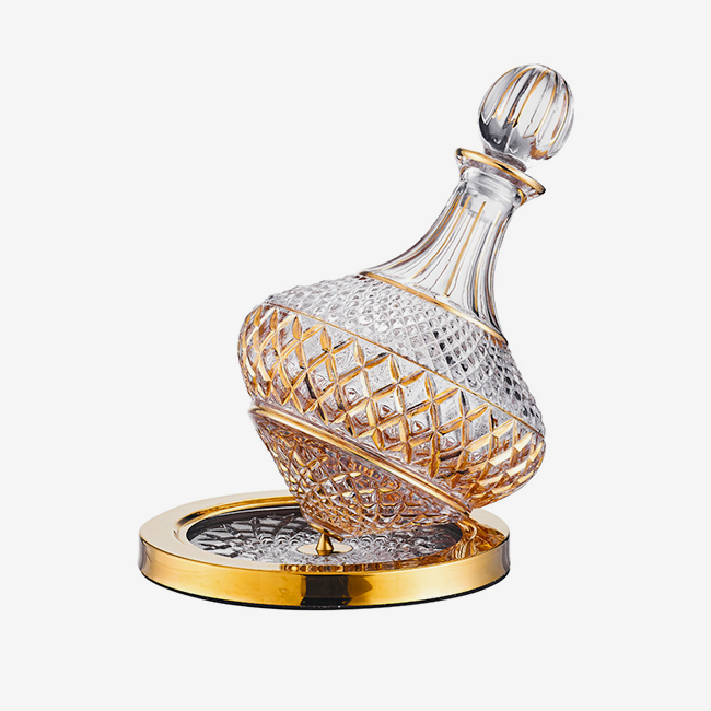 Rotating decanter with stopper