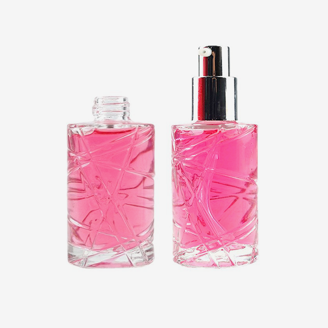 Cylindrical embossed perfume bottle